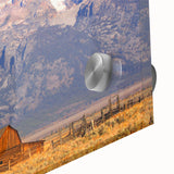 Large abstract depiction of the Grand Tetons in muted earth tones on acrylic glass.