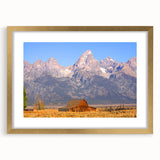 Colorful art of the Grand Tetons with abstract textures in vibrant hues on a large framed canvas.