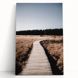 Black and white abstract depiction of autumn trees on a large stretched canvas.