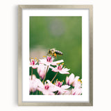 Textured abstract art print depicting spring, with soft green and yellow hues on a silver-framed canvas.
