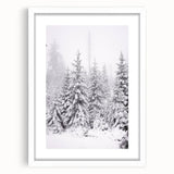 Abstract art print depicting a winter scene in muted blue and white tones on a framed canvas.