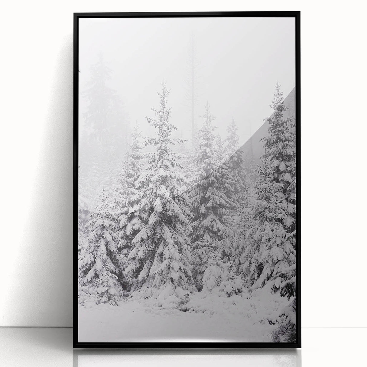 Large abstract wall art depicting winter scene in muted blue and gray tones, framed acrylic.