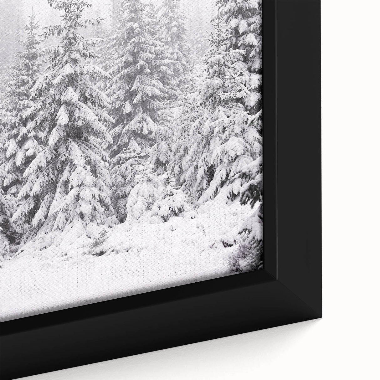 Black wall art depicting a textured winter scene on a framed canvas, with muted colorful accents.