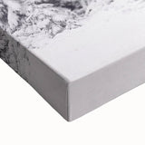 Large art depicting a winter landscape on stretched canvas, in black and white tones, ideal for bedroom wall decor.