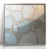 Abstract geometric design featuring a silver-framed acrylic wall art piece with sharp angles and a modern aesthetic. Ideal for contemporary home decor.