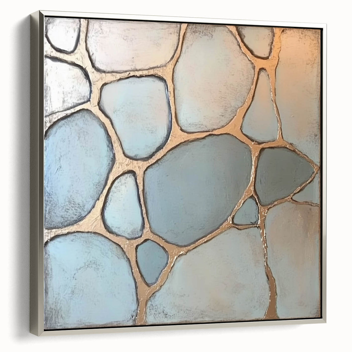 Framed abstract geometric canvas art in silver tones, showcasing a modern design with sharp angles and lines, ideal for contemporary decor.