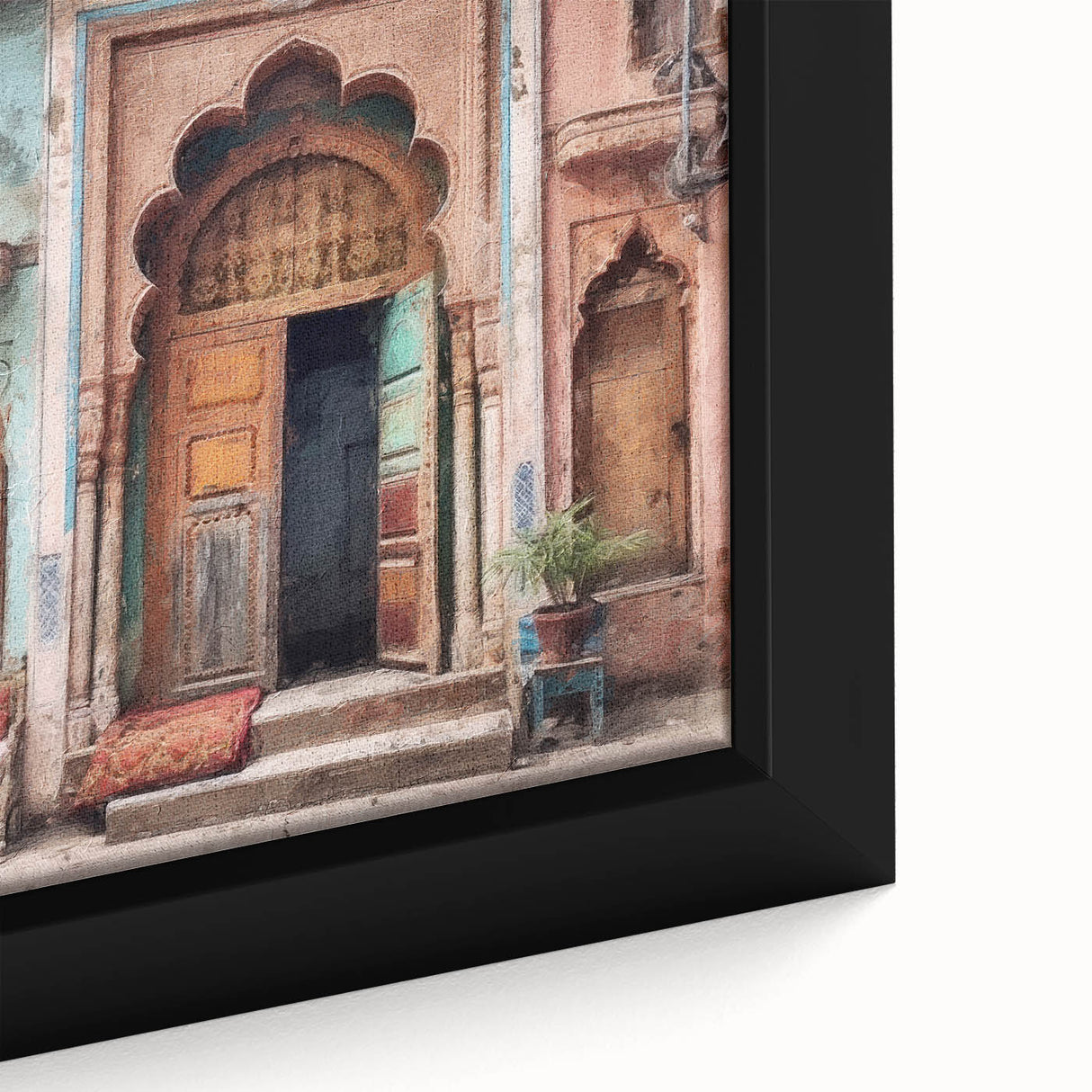 Close-up of a black framed canvas featuring a colorful, textured depiction of an ornate Indian door.