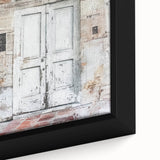 Close-up of a rustic Italian door depicted in textured black wall art on a framed canvas, ideal for living room decor.