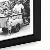 Close-up of black wall art featuring a colorful, textured depiction of people dining, printed on extra large framed canvas.