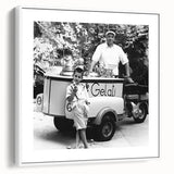 Vintage poster art of a crowded market scene on a framed canvas, featuring colorful art in a black and white setting.