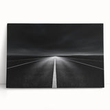 Stretched landscape canvas artwork depicting vibrant African tribal motifs, leaning against a wall, showcasing rich colors and intricate designs for home decor.