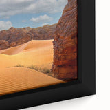 Extra large framed canvas featuring a textured depiction of an Algerian landscape in black with colorful accents.