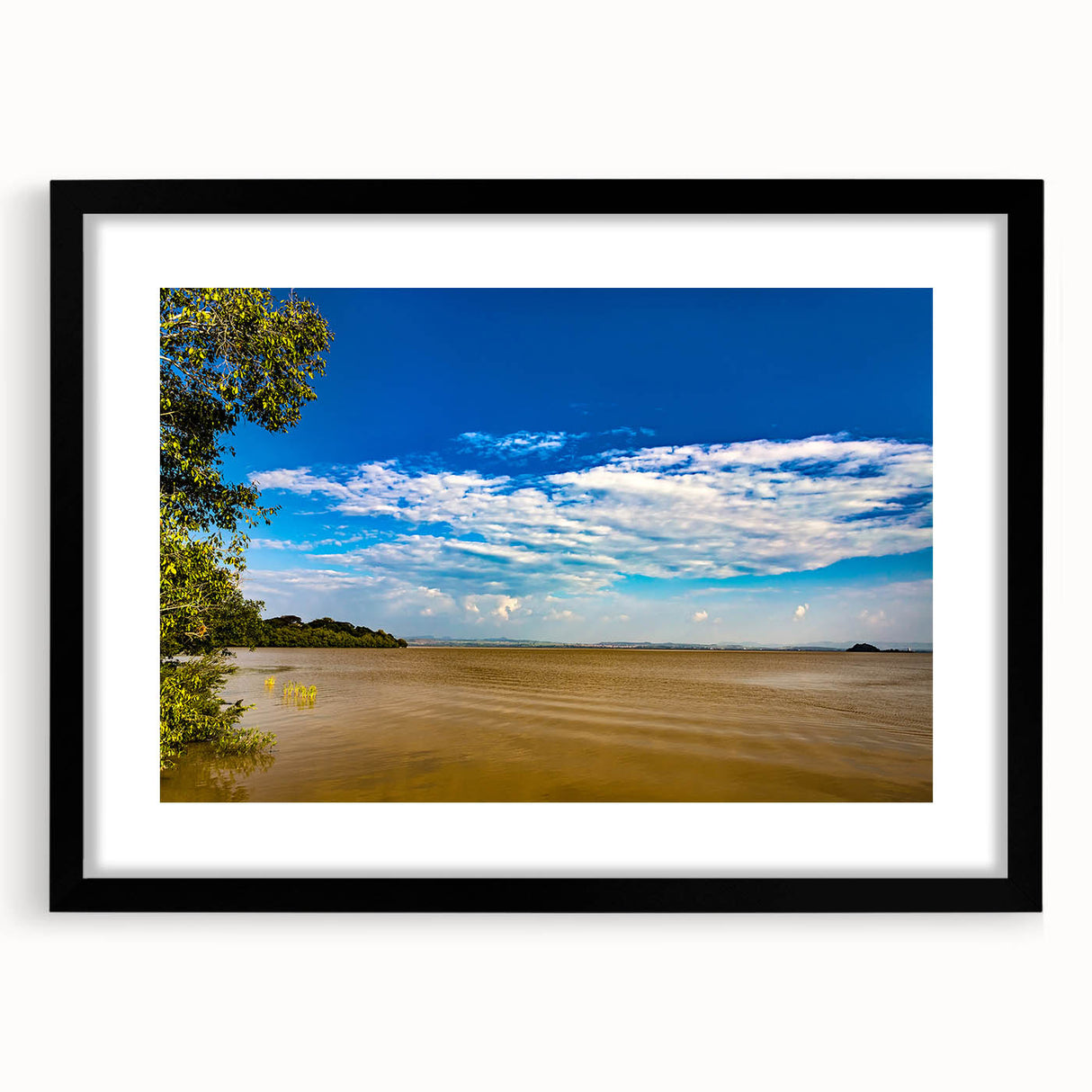 Abstract art print featuring textured, colorful depiction of Ethiopian scenery on a large black-framed canvas.