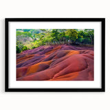 Extra large abstract art print of a colorful, textured African scenery on a black framed canvas, ideal for living room decor.