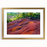 Textured abstract art print of a stylized African scenery in gold frame, ideal for bedroom art.