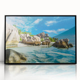 Large abstract wall art featuring a serene Seychelles scenery in muted blue and green tones on a framed acrylic.