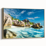 Framed canvas depicting a serene Seychelles landscape with lush greenery and ocean views, ideal for bedroom wall art.