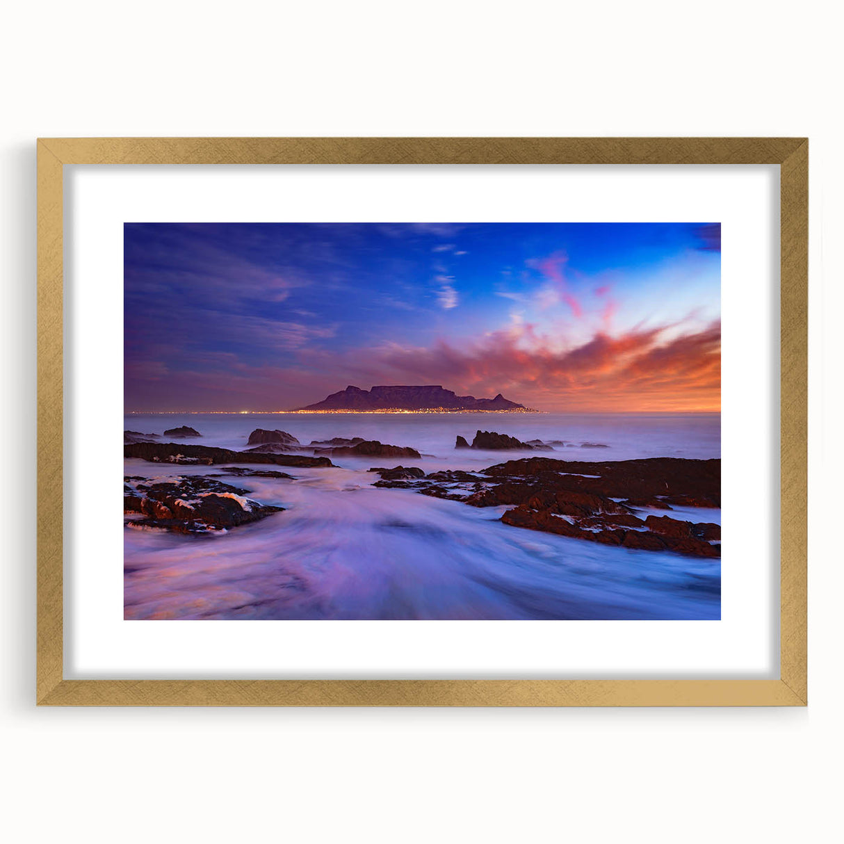Extra large wall art depicting an abstract African scenery in textured gold and earth tones, framed with a mat.