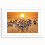 Abstract art print depicting a serene Tanzanian landscape in earthy tones on a framed white mat, ideal for dining room decor.
