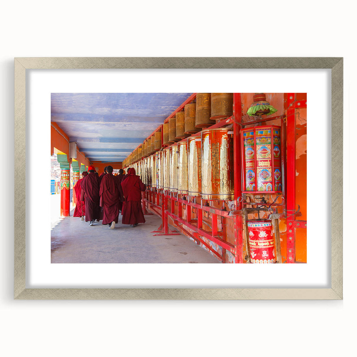 Textured abstract art print of a Bhutanese landscape in muted earth tones, framed in silver, ideal for bedroom art.