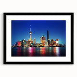 Extra large abstract art print of Shanghai skyline in vibrant colors on a textured canvas, framed in black.
