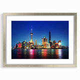 Textured art print depicting an abstract Shanghai skyline in muted grays and blues on a framed canvas.