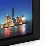 Extra large framed canvas of Shanghai skyline in black with colorful, textured highlights, ideal for living room decor.
