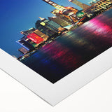 Art deco poster of Shanghai skyline in muted gold and black tones on rolled canvas, suitable for dining room wall art.