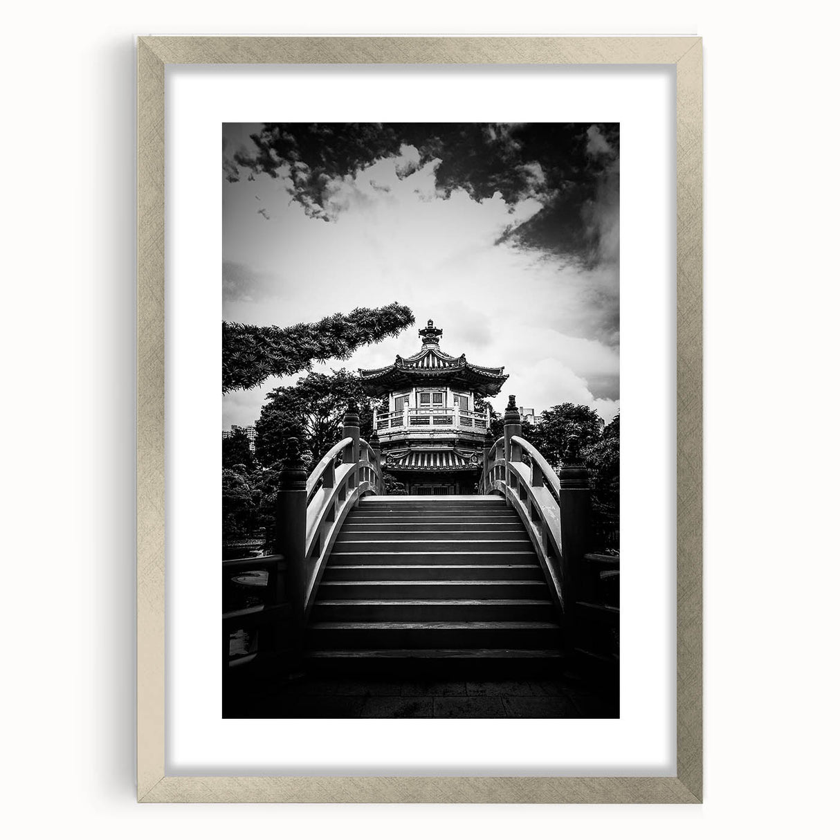 Textured abstract art print of Hong Kong skyline in muted gray and silver tones, framed with a silver mat.