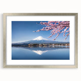 Textured art print of Mount Fuji in abstract style, featuring muted blue and gray tones on a framed silver mat.
