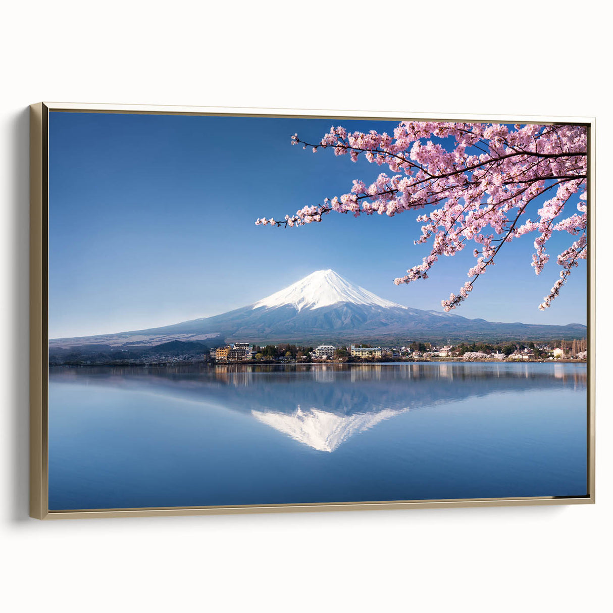 Framed canvas of Mount Fuji with a vintage poster style in black and gold, ideal for bedroom wall art.