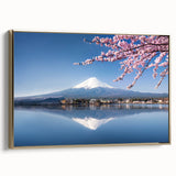Framed canvas of Mount Fuji with a vintage poster style in black and gold, ideal for bedroom wall art.