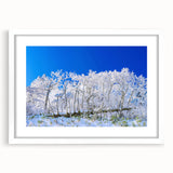 Abstract art print of an Asian landscape in muted earth tones on a framed white canvas, ideal for dining room decor.