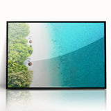 Large abstract wall art of a Maldivian scenery in muted blue and green, framed in black acrylic.