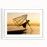 Abstract art print of a Myanmar scenery in muted earth tones on a framed white mat.