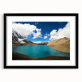 Abstract art print featuring colorful, textured scenery of Nepal in a large black frame, suitable for living room decor.