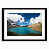 Abstract art print featuring colorful, textured scenery of Nepal in a large black frame, suitable for living room decor.
