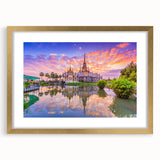 Extra large wall art featuring an abstract depiction of a Vietnamese landscape in textured gold and green tones.