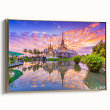 Framed canvas wall art featuring a vintage-style landscape of a Vietnamese scenery in black and gold tones.