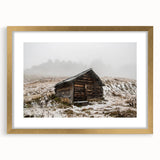 Textured abstract art print of Adelaide scenery in muted earth tones, framed in gold, ideal for bedroom art.