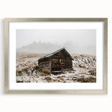 Abstract art print of Adelaide scenery in muted gray and silver tones on a framed poster.