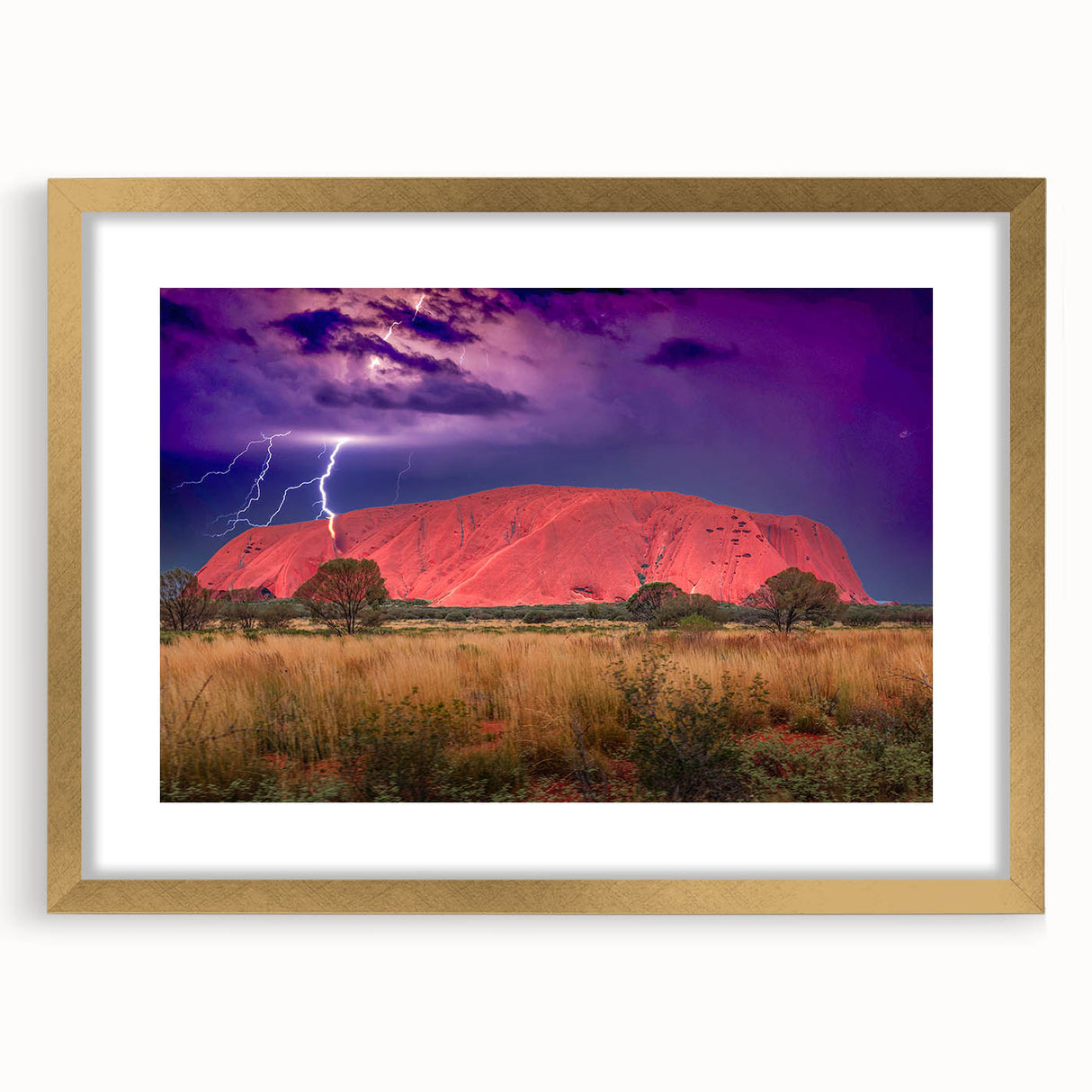 Textured abstract print of Ayers Rock in earth tones on a framed canvas, suitable for bedroom art.