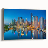 Vintage poster art of Brisbane skyline in colorful hues on a large framed canvas, suitable for living room decor.