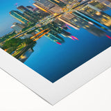 Art deco poster of Brisbane skyline in muted gold and navy tones on rolled canvas, suitable for dining room wall art.