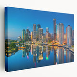 Panoramic view of the Brisbane skyline on large stretched canvas, with soft evening colors, ideal for kitchen wall art.