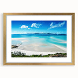 Textured art print of the Great Barrier Reef in vibrant blue and green hues on a framed gold mat, ideal for bedroom decor.