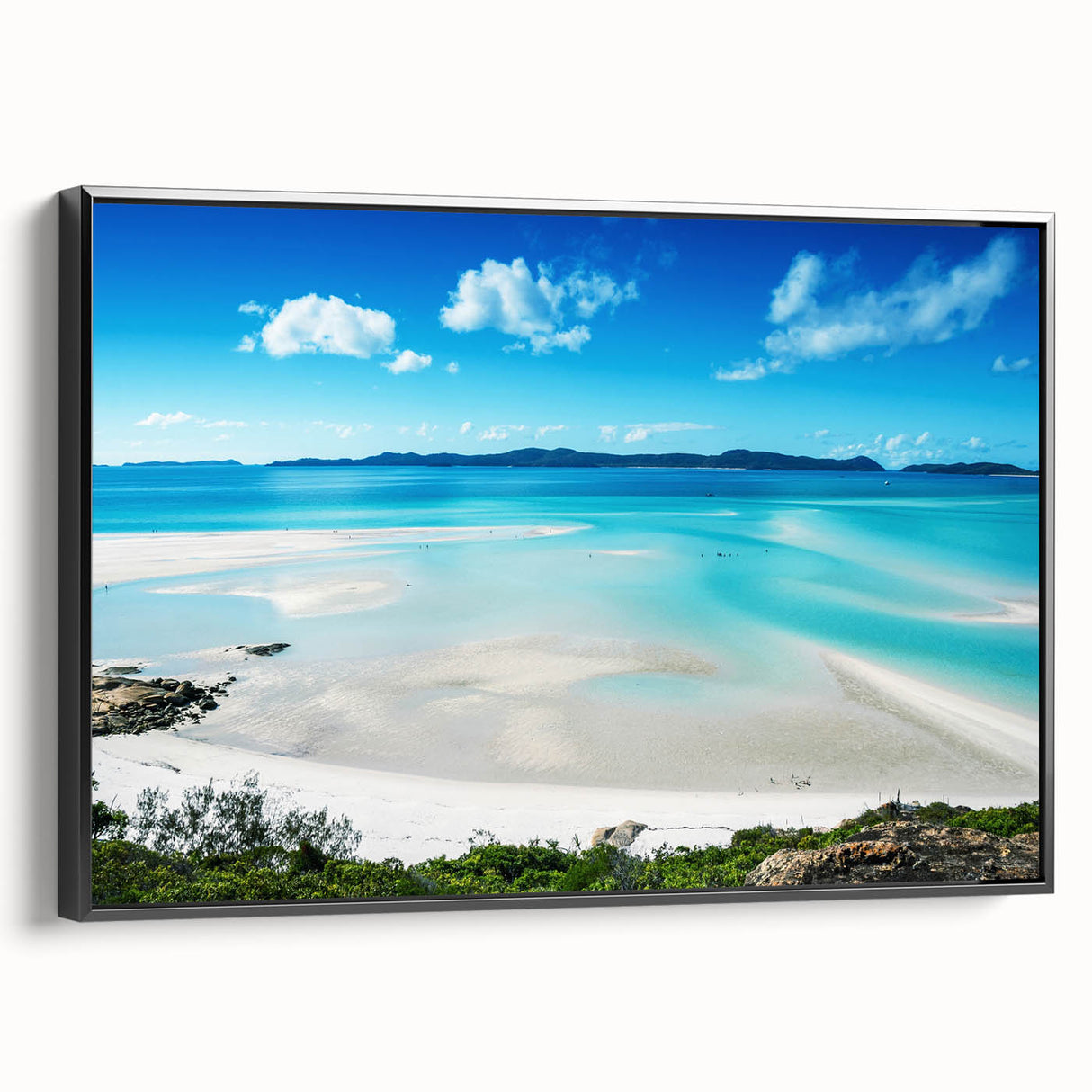 Black and white framed canvas of the Great Barrier Reef, ideal for bedroom wall decor.