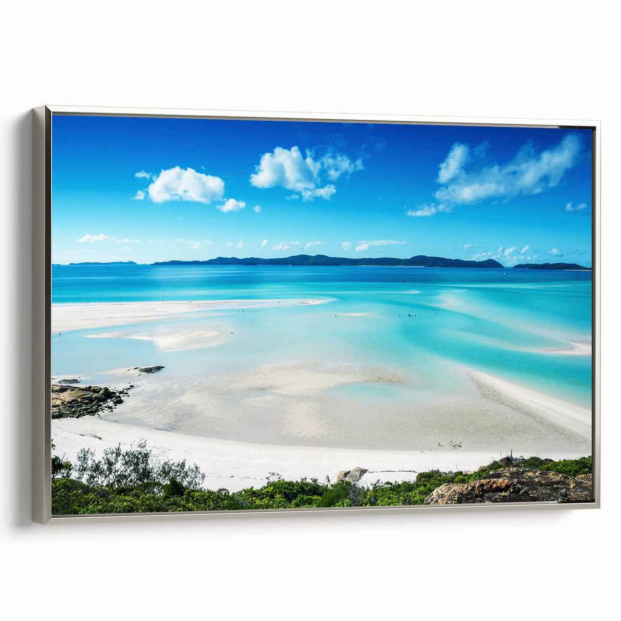 Vintage poster art of the Great Barrier Reef on a framed canvas, featuring colorful marine imagery.