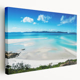 Large art print of the Great Barrier Reef in vibrant blue and green tones on stretched canvas, ideal for kitchen wall art.
