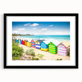 Abstract art print of Melbourne scenery in vibrant colors on a black framed canvas, ideal for living room decor.